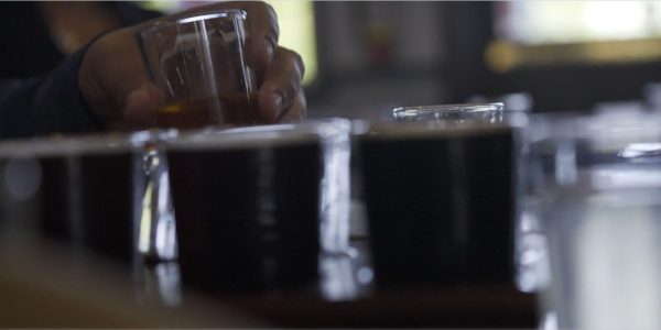 Close up image of a flight of beers